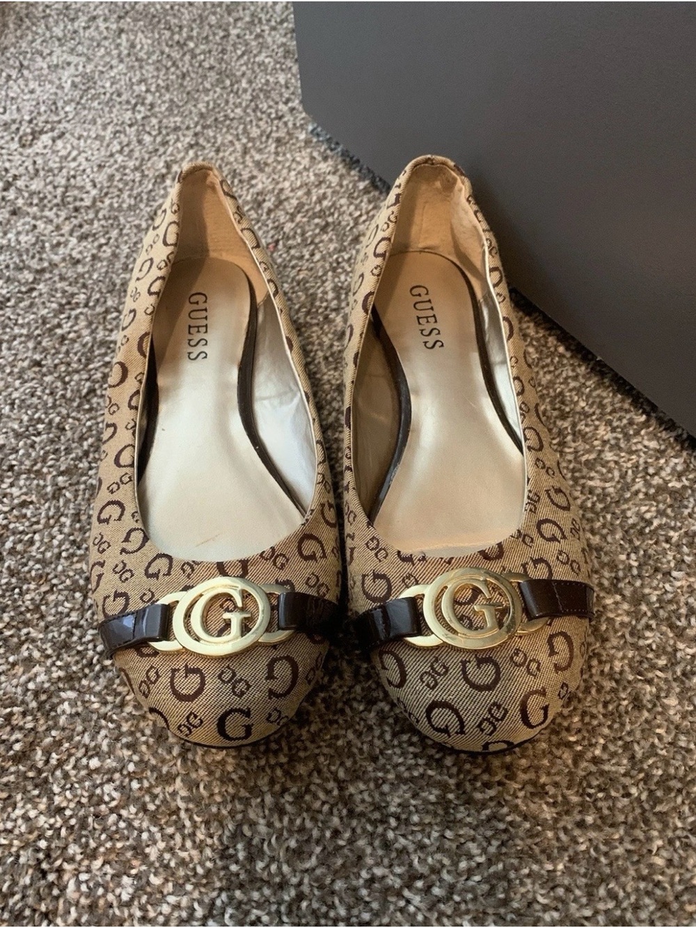 GUESS Tan Logo Ballet Flats with Dark Brown Trim and Gold Emblem